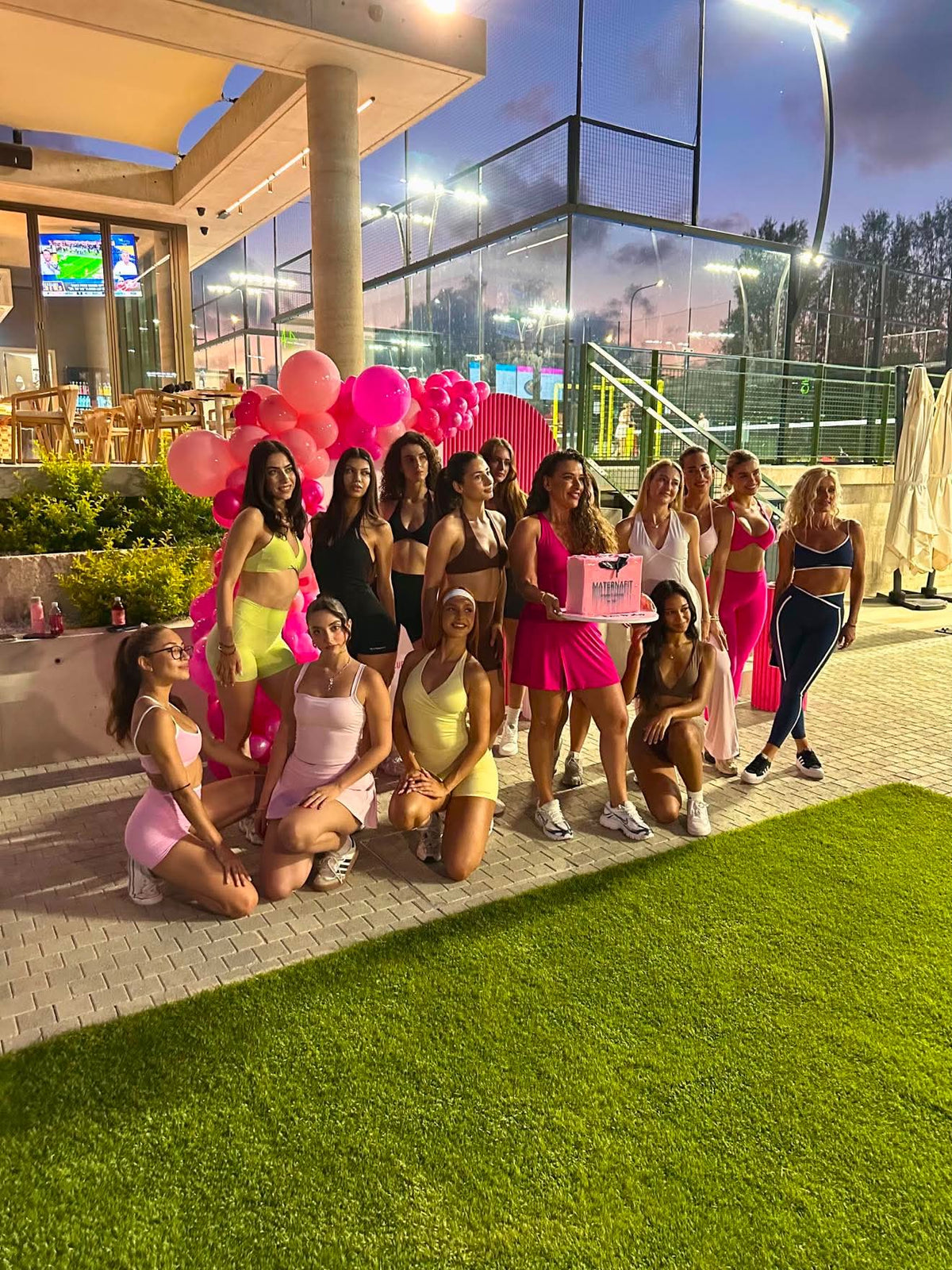 The MaternaFit group posing together in activewear during the same gym shoot